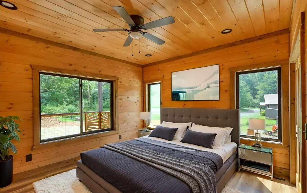 Bedroom with two large windows, shown virtually staged