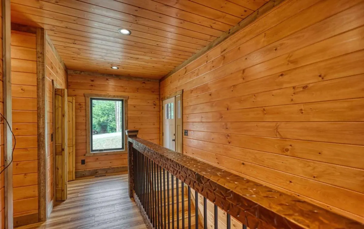 Upstairs hallway with an open rail to the stairs